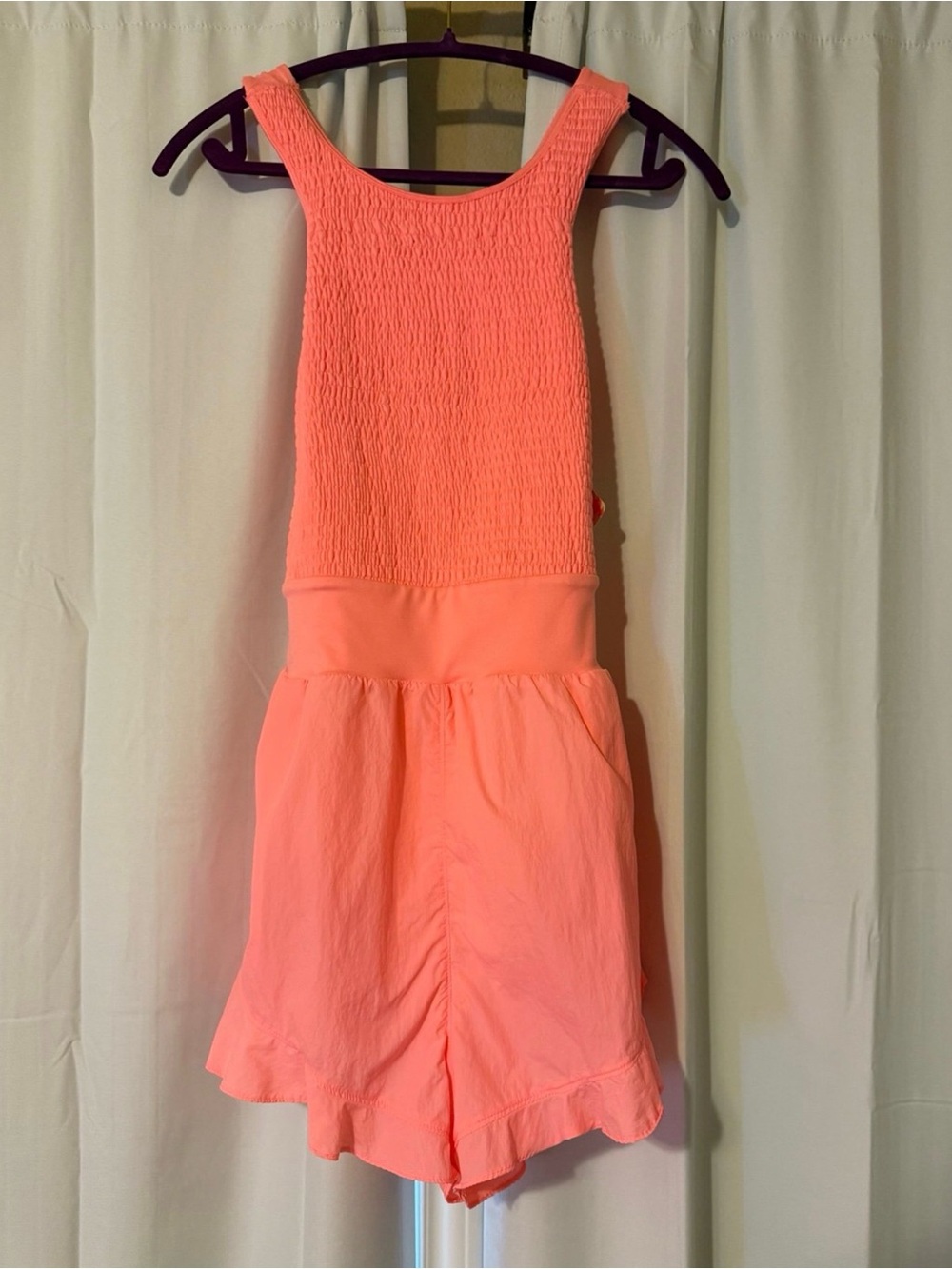 Free People Movement “Breathless Shortsie” Romper – Papaya Punch (Size Large)